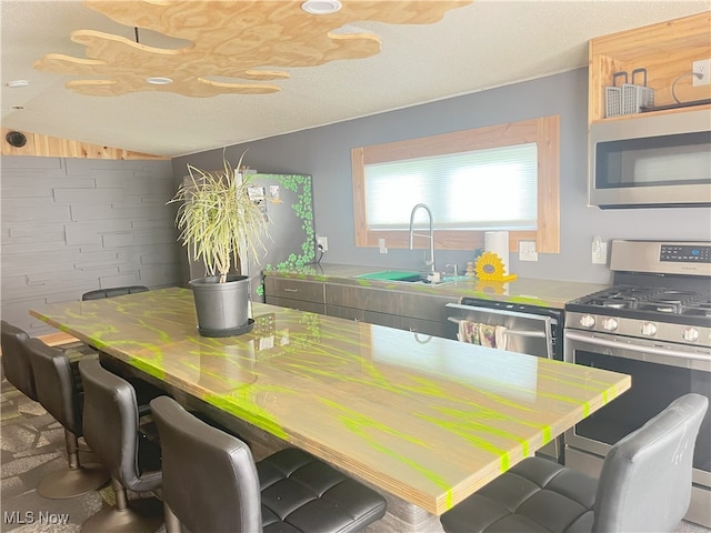 dining area featuring vaulted ceiling