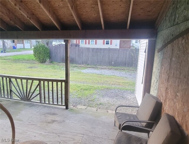 view of patio / terrace featuring fence