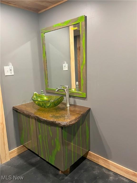 1376 Fairview Ave, Atwater, OH 44201 - room details featuring baseboards, vanity, and concrete floors