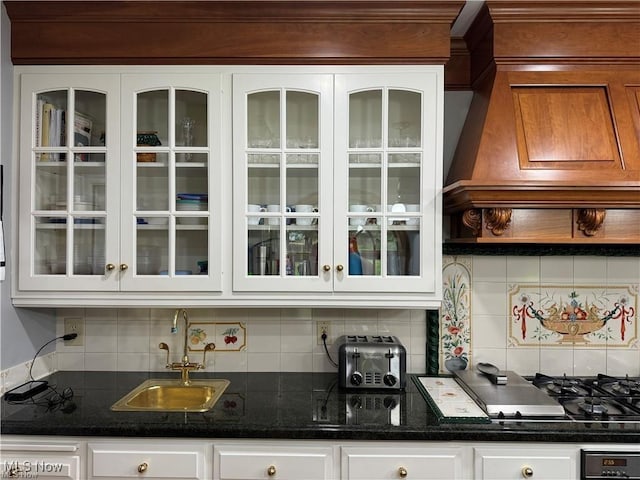 3016 Croydon Dr NW, Canton, OH 44718 - bar with black stovetop, wet bar, tasteful backsplash, and a sink
