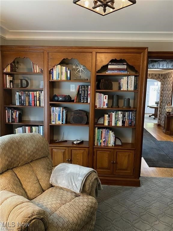 3016 Croydon Dr NW, Canton, OH 44718 - sitting room featuring ornamental molding and wood finished floors