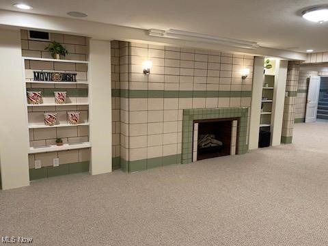 3016 Croydon Dr NW, Canton, OH 44718 - unfurnished living room with recessed lighting, carpet, and a tile fireplace