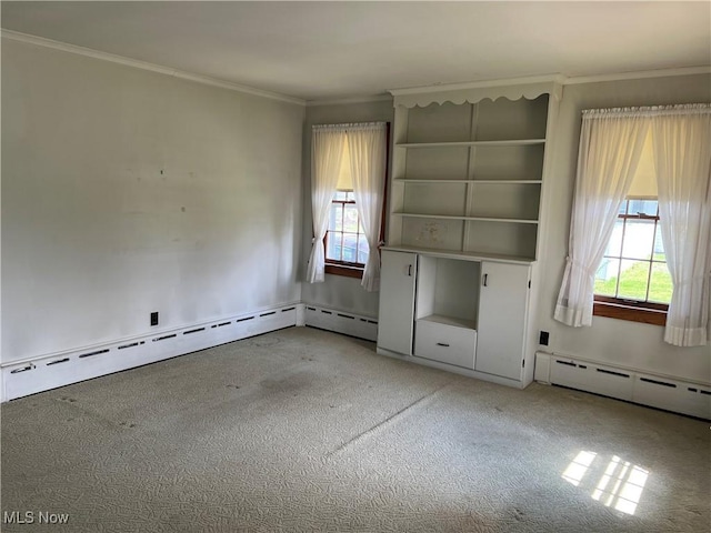 201 Gilcher Ct, Sandusky, OH 44870 - interior space with a baseboard radiator, crown molding, and carpet