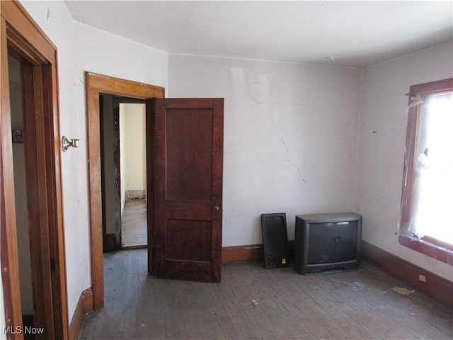 325 Hillwood Dr, Akron, OH 44320 - empty room with a healthy amount of sunlight and hardwood / wood-style floors