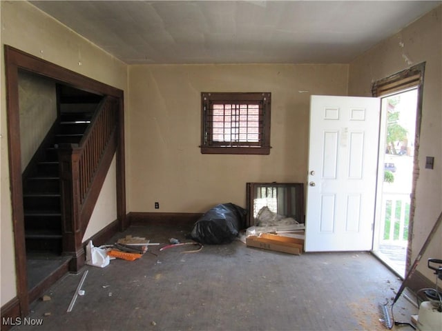 325 Hillwood Dr, Akron, OH 44320 - foyer entrance featuring baseboards, a healthy amount of sunlight, and stairs