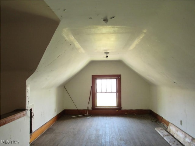 325 Hillwood Dr, Akron, OH 44320 - bonus room featuring hardwood / wood-style flooring, baseboards, and vaulted ceiling