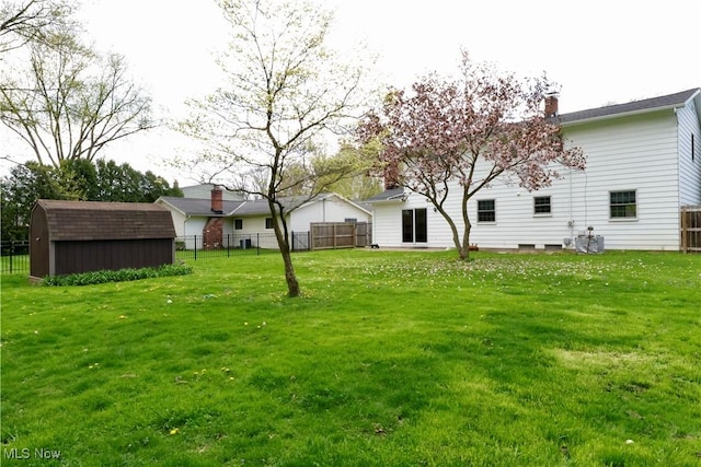 4479 Azalea Ln, North Olmsted, OH 44070 - view of yard featuring an outbuilding, a shed, and fence