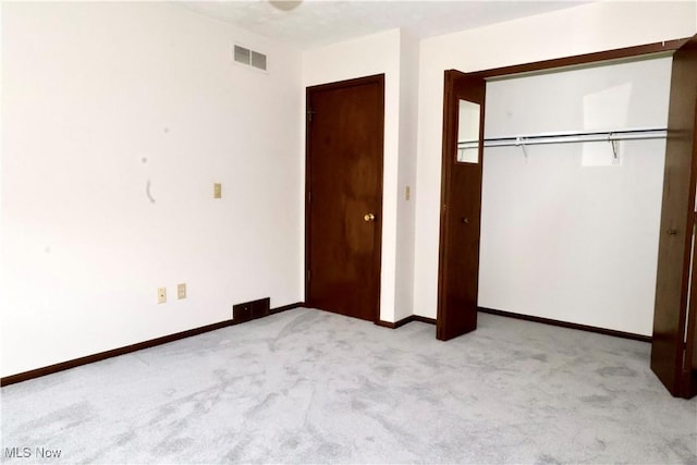 4479 Azalea Ln, North Olmsted, OH 44070 - unfurnished bedroom with baseboards, visible vents, a closet, and light colored carpet