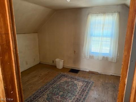944 Bey Rd, Akron, OH 44312 - bonus room featuring vaulted ceiling and wood finished floors
