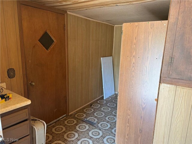 944 Bey Rd, Akron, OH 44312 - hallway featuring wooden walls