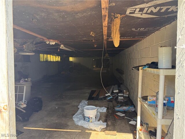 944 Bey Rd, Akron, OH 44312 - basement featuring concrete block wall