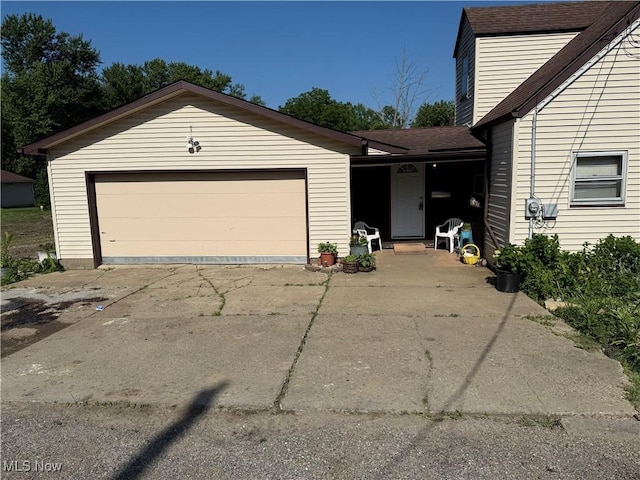 944 Bey Rd, Akron, OH 44312 - garage with concrete driveway