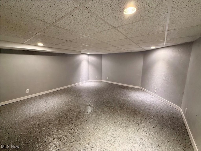 609 Main St, Toronto, OH 43964 - finished below grade area with a paneled ceiling, baseboards, and recessed lighting