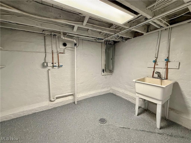 unfinished below grade area with electric panel