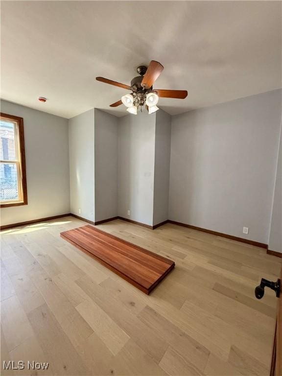 609 Main St, Toronto, OH 43964 - unfurnished room featuring light wood-style floors, baseboards, and ceiling fan
