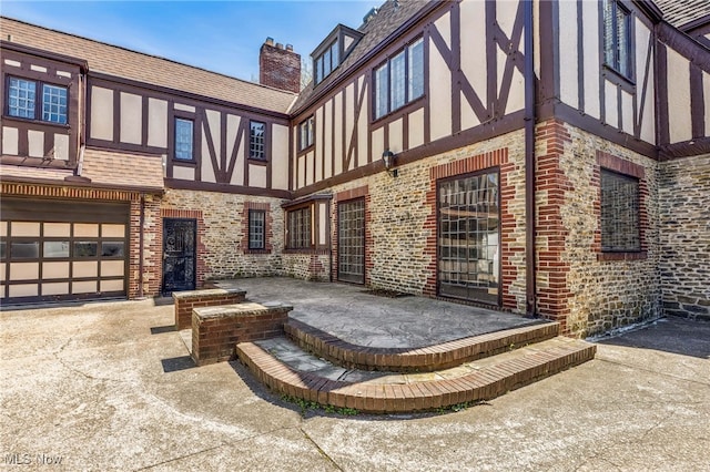 exterior space featuring an attached garage