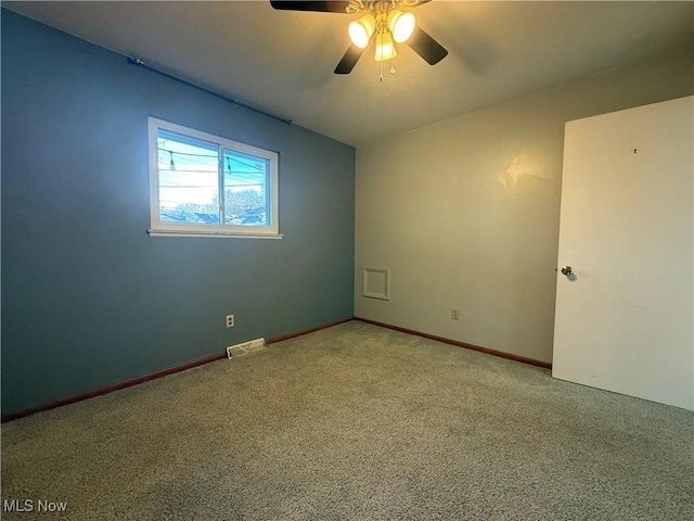 9083 Priem Rd, Strongsville, OH 44149 - carpeted spare room featuring baseboards, a ceiling fan, and visible vents