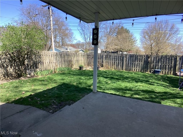 9083 Priem Rd, Strongsville, OH 44149 - view of yard with a patio area and a fenced backyard