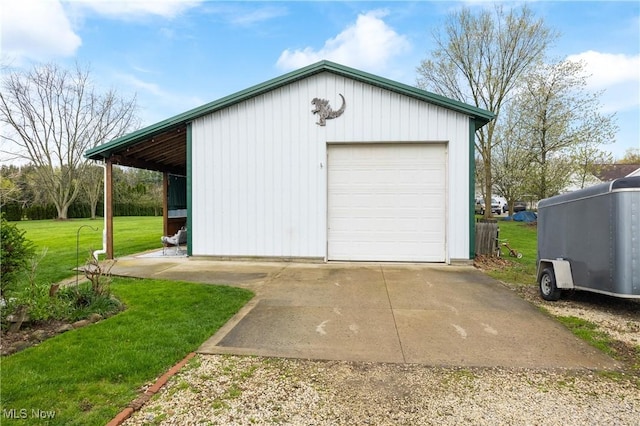 garage featuring concrete driveway and a garage