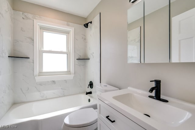 full bath featuring vanity, shower / tub combination, and toilet