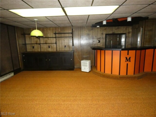 403 Sandy Dr, Cambridge, OH 43725 - bar area with wood walls, carpet floors, and a drop ceiling