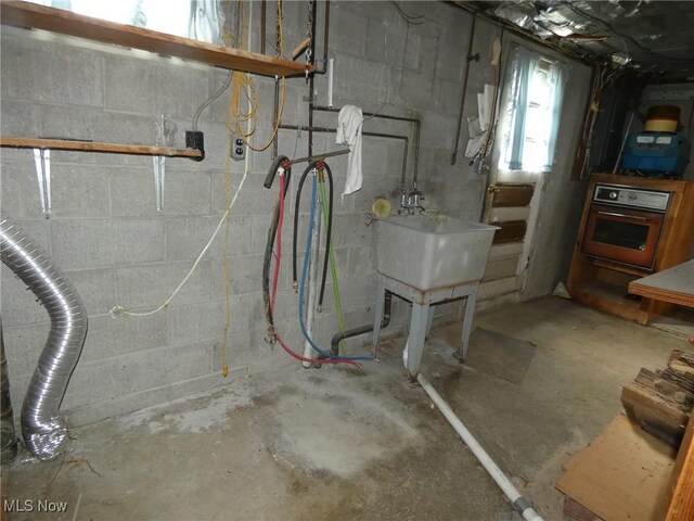 403 Sandy Dr, Cambridge, OH 43725 - unfinished below grade area featuring a sink