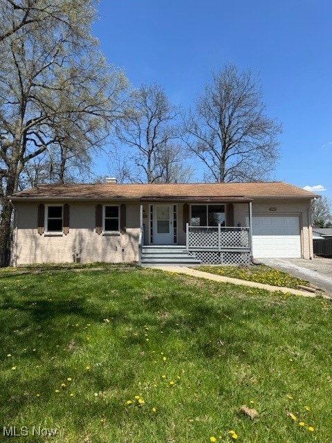 5742 Baylor, Youngstown, OH 44515 - ranch-style home featuring central AC, a garage, driveway, a porch, and a front yard