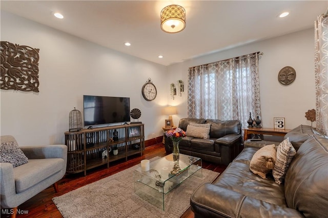 353 W N Ave, East Palestine, OH 44413 - living area with wood finished floors, recessed lighting, and baseboards