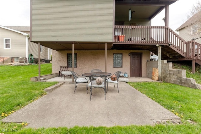353 W N Ave, East Palestine, OH 44413 - view of patio with a wooden deck, outdoor dining space, and stairs