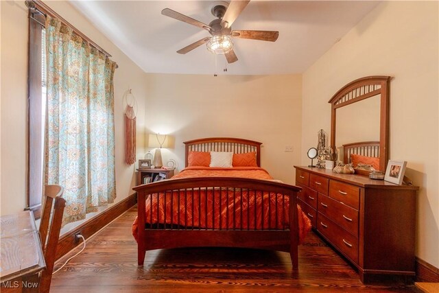 353 W N Ave, East Palestine, OH 44413 - bedroom with dark wood-style flooring and a ceiling fan