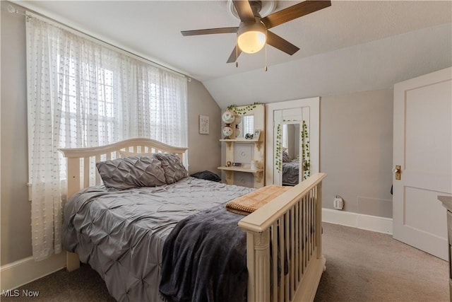 353 W N Ave, East Palestine, OH 44413 - carpeted bedroom with lofted ceiling, baseboards, and a ceiling fan
