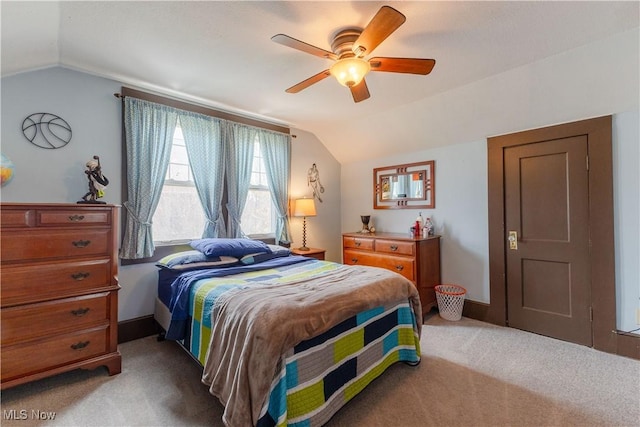 353 W N Ave, East Palestine, OH 44413 - bedroom with lofted ceiling, light carpet, ceiling fan, and baseboards