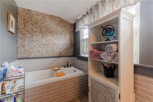 353 W N Ave, East Palestine, OH 44413 - full bathroom featuring lofted ceiling and a garden tub
