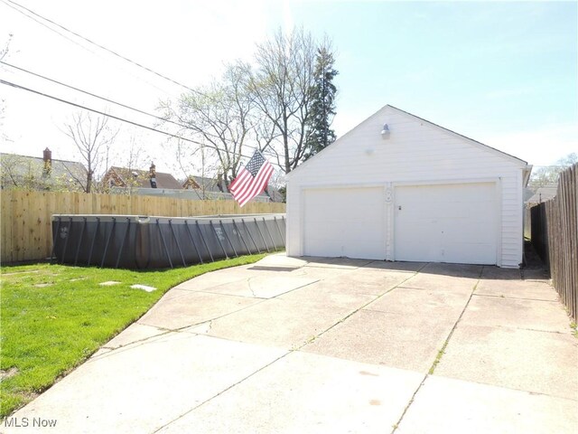 detached garage with fence