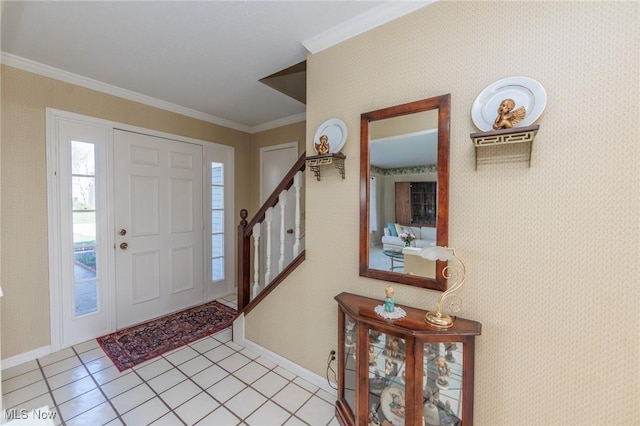 entrance foyer featuring light tile patterned floors, baseboards, stairway, and ornamental molding