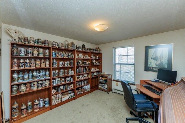office with baseboard heating and carpet flooring