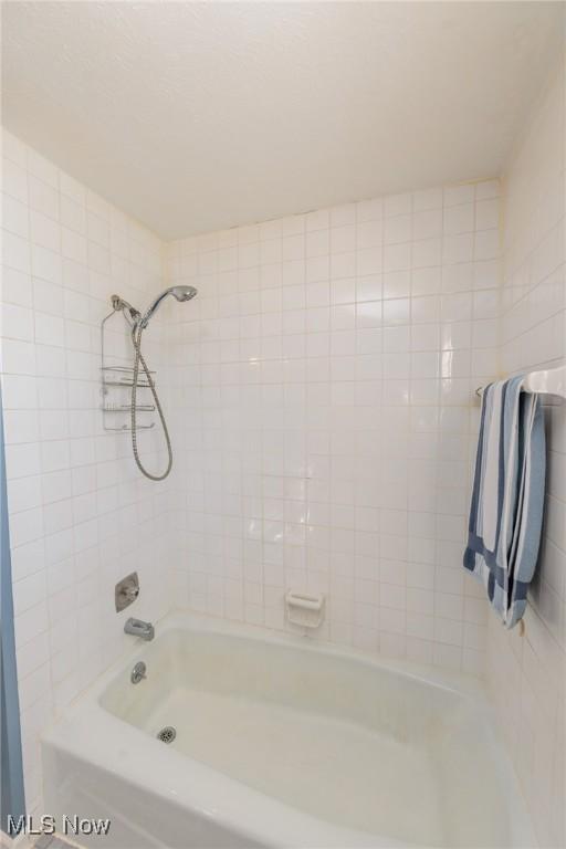 bathroom featuring tub / shower combination
