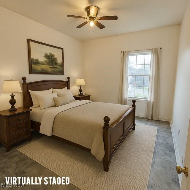 bedroom with ceiling fan, baseboards, and light tile patterned floors