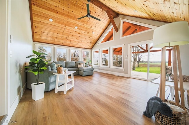 sunroom featuring beamed ceiling
