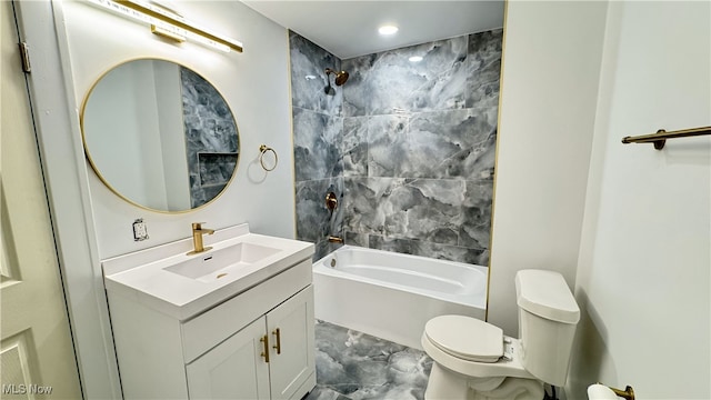 bathroom featuring vanity, marble finish floor, shower / tub combination, and toilet
