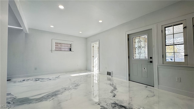 entryway featuring recessed lighting, visible vents, and baseboards
