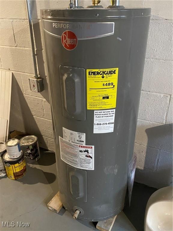 utility room with water heater