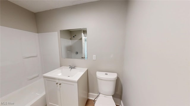 full bath with vanity, toilet, and a shower