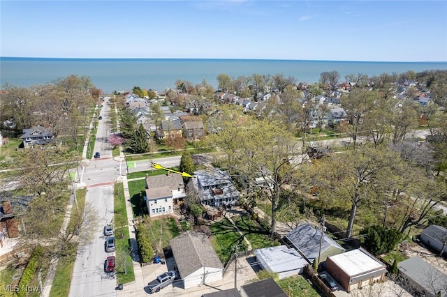 birds eye view of property featuring a residential view and a water view