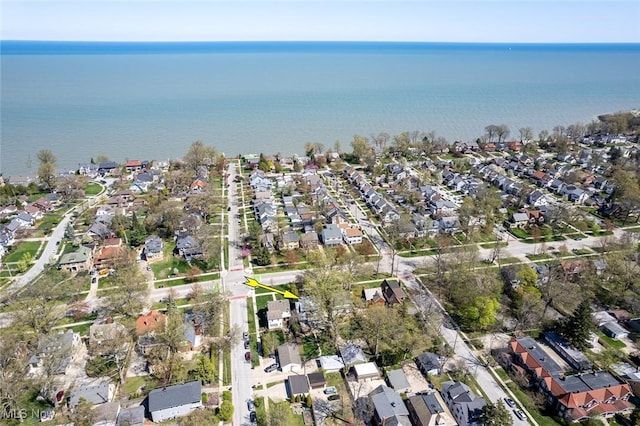 aerial view with a residential view and a water view