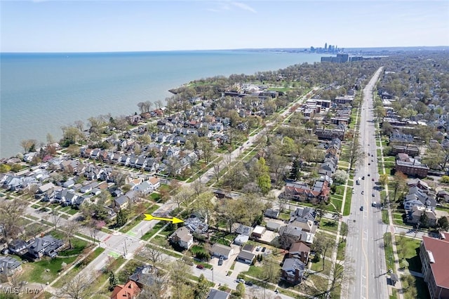 aerial view featuring a residential view and a water view