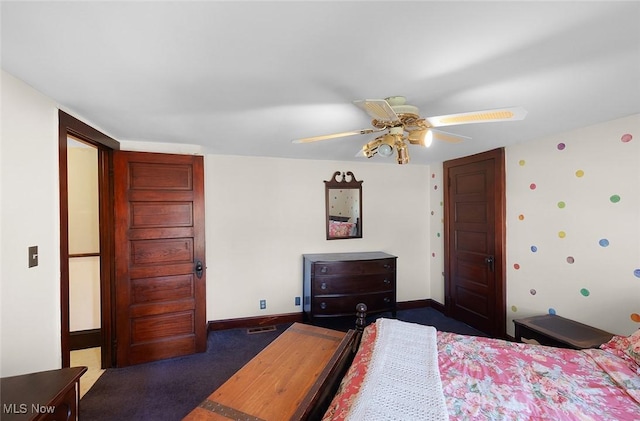 bedroom with carpet, visible vents, baseboards, and ceiling fan