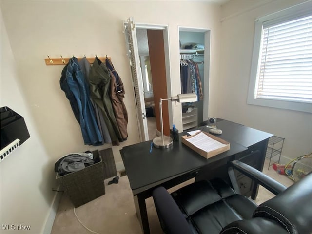 office space featuring baseboards
