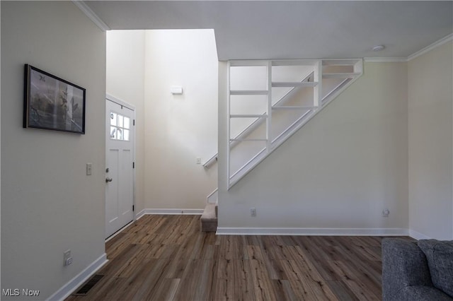 760 N Medina Line Rd, Akron, OH 44333 - entrance foyer with crown molding, wood finished floors, stairs, baseboards, and visible vents