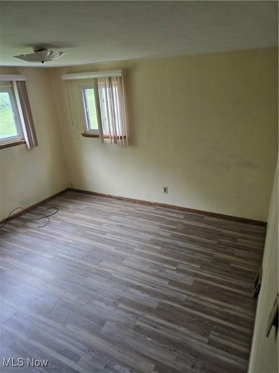 3742 Concord Dr, Beachwood, OH 44122 - unfurnished room with plenty of natural light, wood finished floors, and baseboards